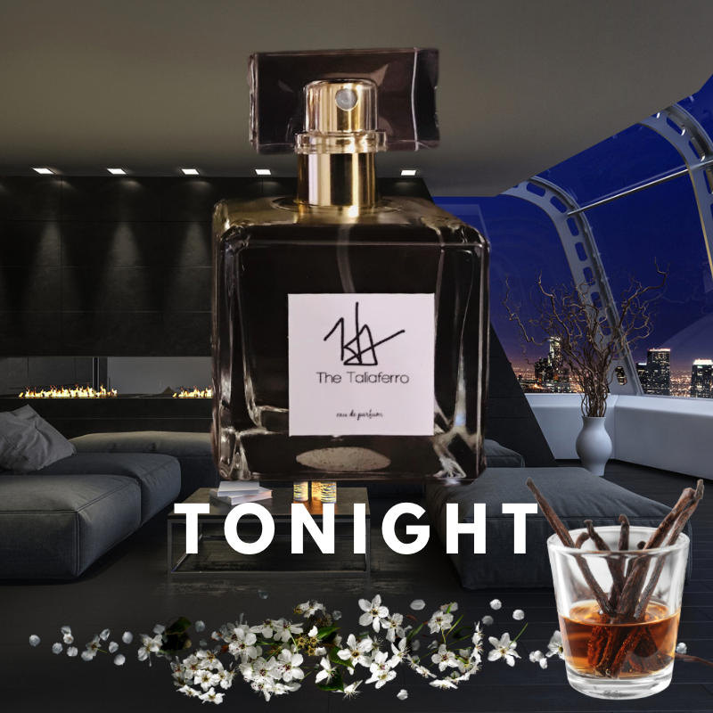 A large bottle of perfume with a gold cap, labeled 'Tonight', displayed on a table with flowers and a cityscape in the background.